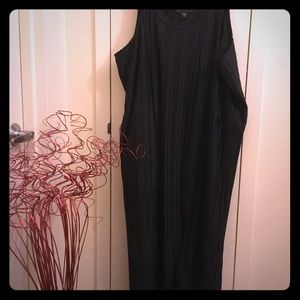 Pleated tank dress with lining.